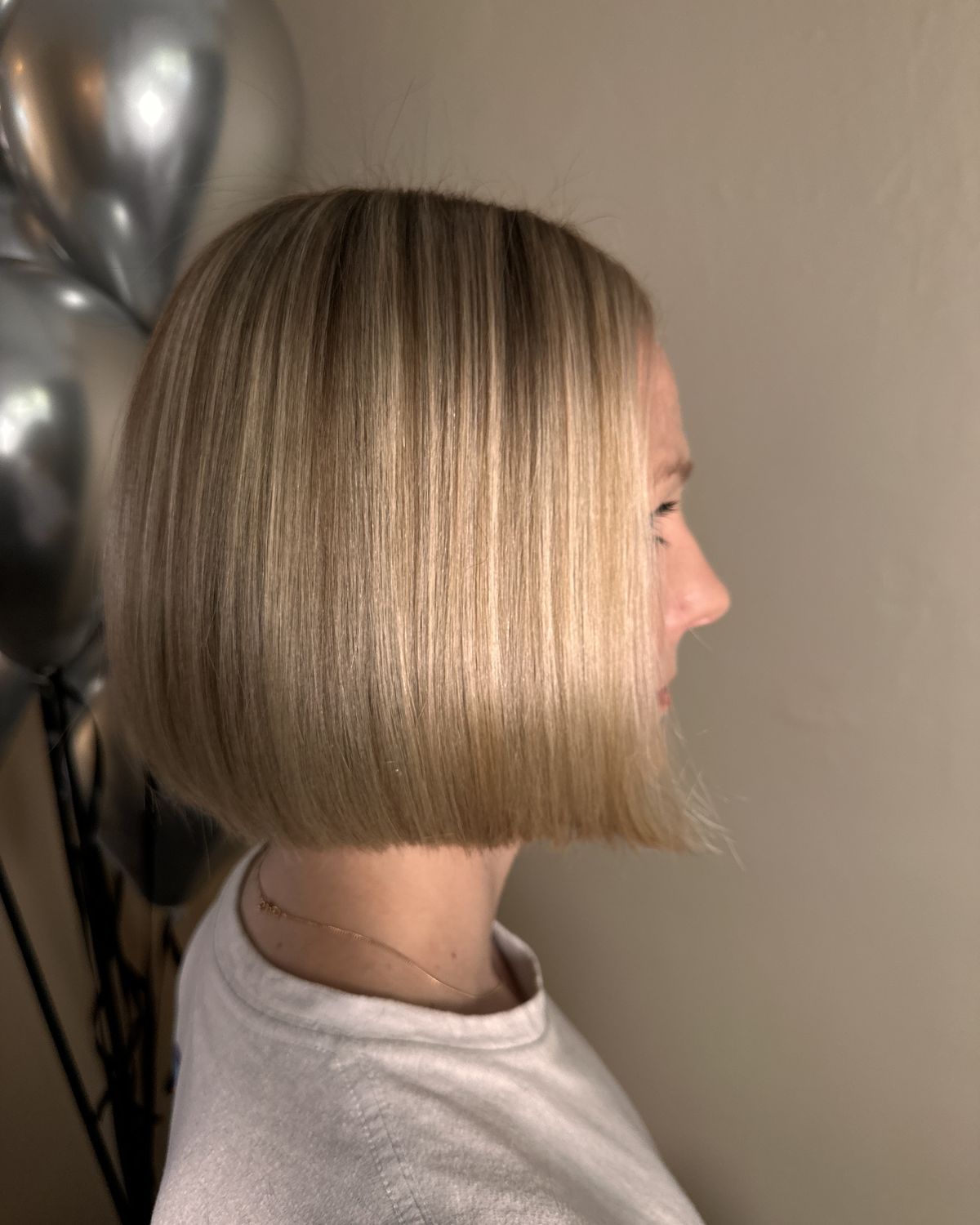 Short, straight bob in a natural blonde shade